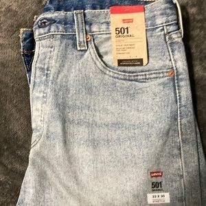Brand new with tags Levi’s 501’s size 33x30 “stretch” fit original.